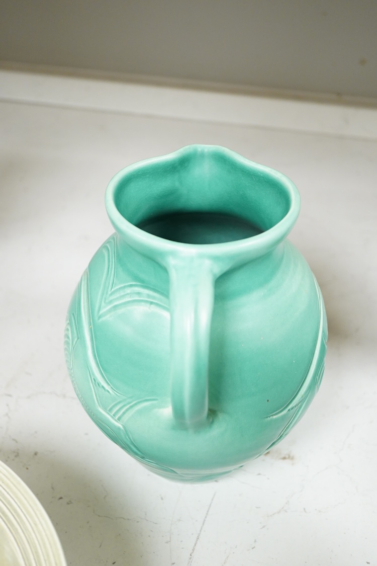 A Susie Cooper incised jug, 22cm high and similar bowl, each incised with animals (2)